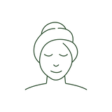 Line art icon of a woman's face with a towel wrap, representing facial treatments or spa care.